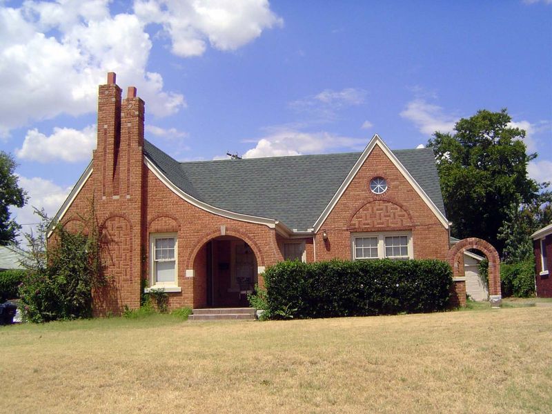 Farther east, within walking distance of the O.U. Health Sciences Center, this 1928 brick Tudor Revival is at 1017 Dean Place. You'd think P