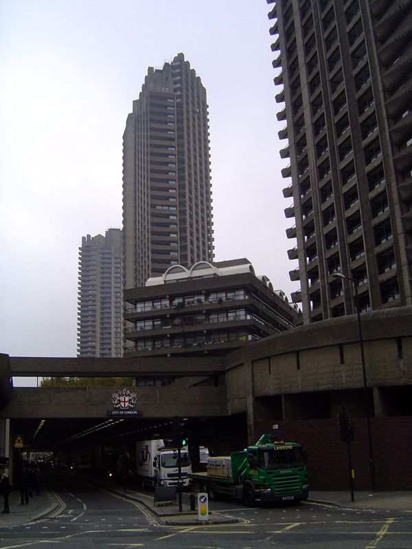 Grim? This is the Barbican Estate with three tall but by no means cheap apartment buildings on a site cleared by the blitz. Pevsner write th
