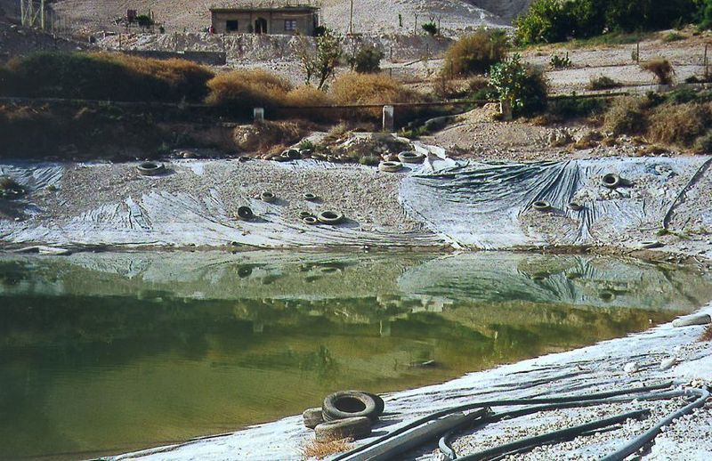Down near the toe of the alluvial fan shown in the last picture there's a famous spring, Ein Sultan. A storage pond had been lined with plas