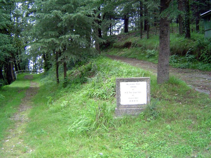 Inside, a quiet lane with a stone commemorating the visit of Lady Willingdon, the viceroy's wife. The original house was owned by a Peterson