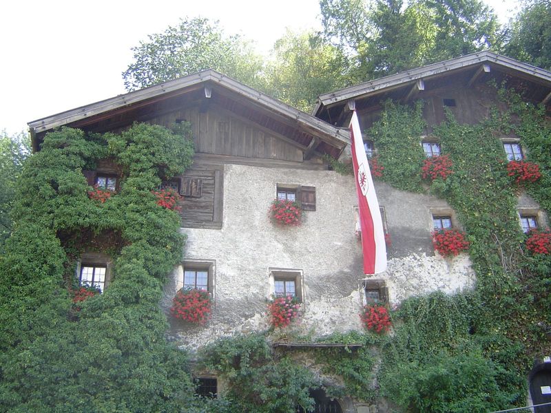 A house set into a cliff and now partly developed as a museum.