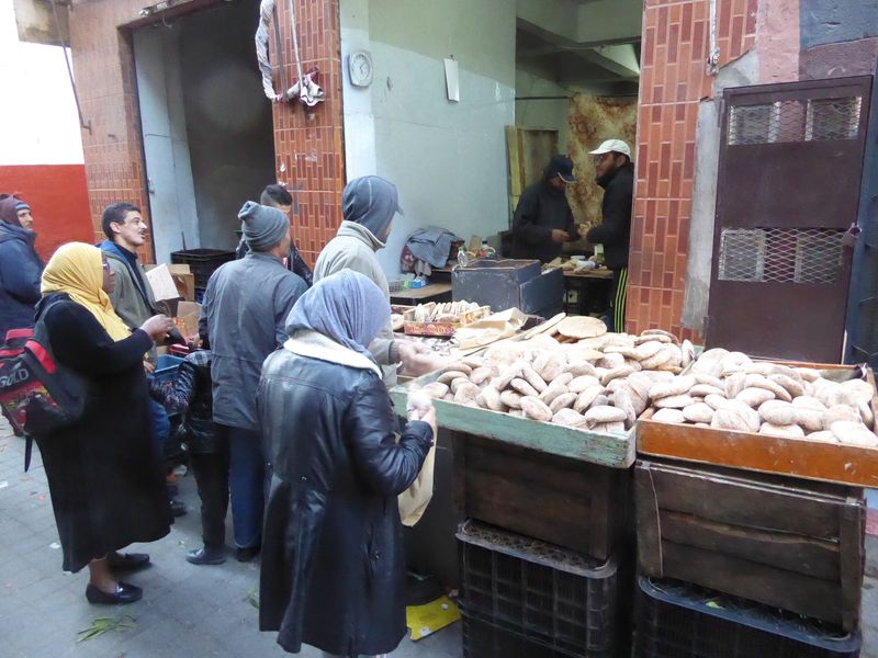 Just around the corner, there's a real baker, a reminder that the old city has its old ways.