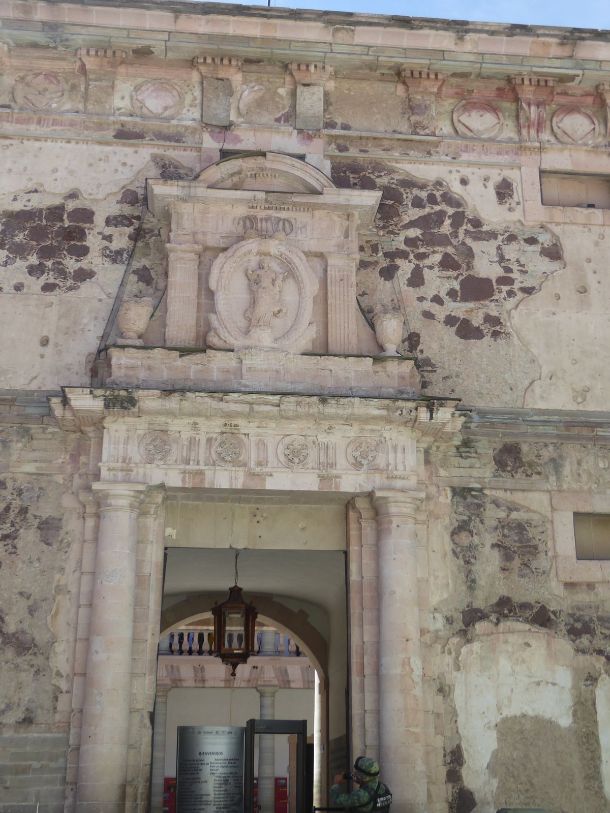 The classical allusions included not only triglyphs and metopes but a now-worn medallion. Appropriately for a granary, it depicts Ceres.