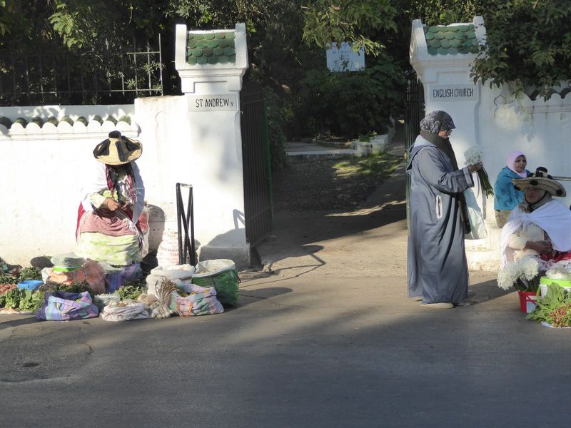The market women include Berbers in Berber dress.