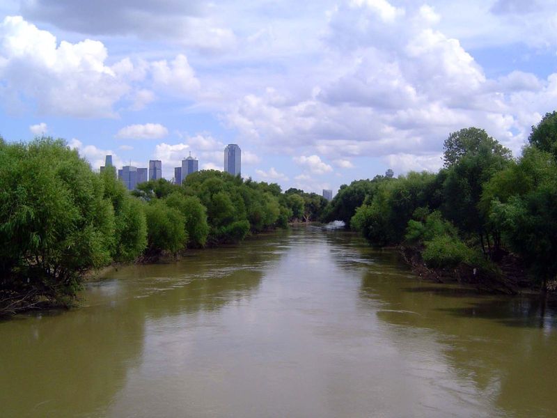 Meanwhile, the Trinity flows along. A hotly debated plan has the city building a new bypass highway at the edge of the floodplain. I-35 is t