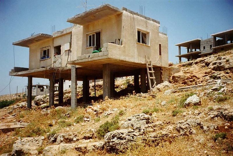A typical home of the sort built on the West Bank today for families of average means. The owner lost his permit to work in Israel and so wo