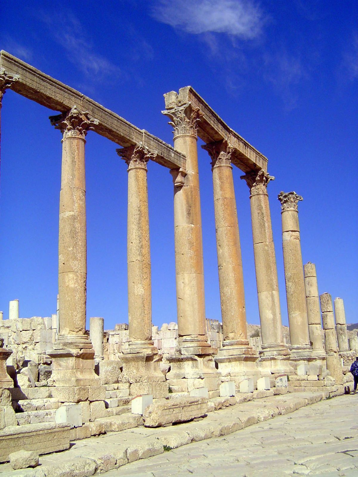 The four taller columns mark the entrance to the Roman city's market, the macellum.