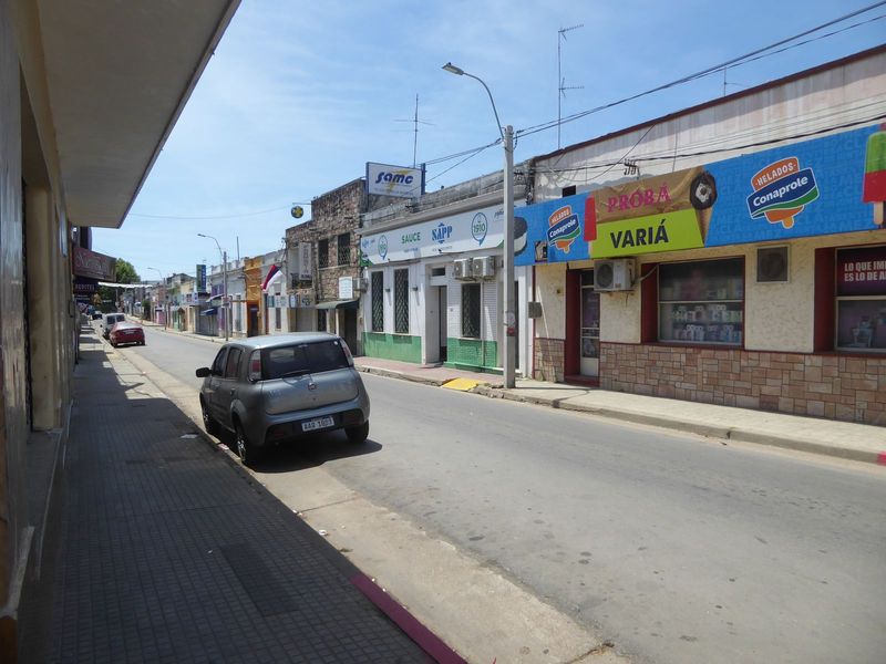 The surrounding shops are one-story affairs.