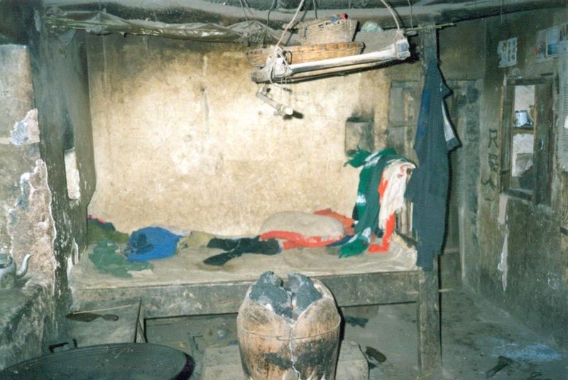 Bedroom, with brazier and wok.
