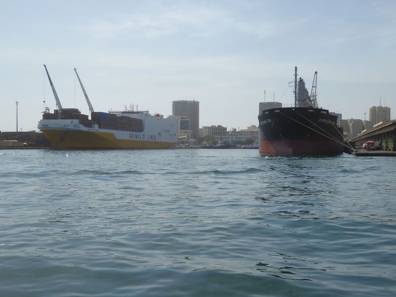 Here's an Italian-owned geared container ship, so-called because it has its own cranes with which to pick up and drop off containers at smal