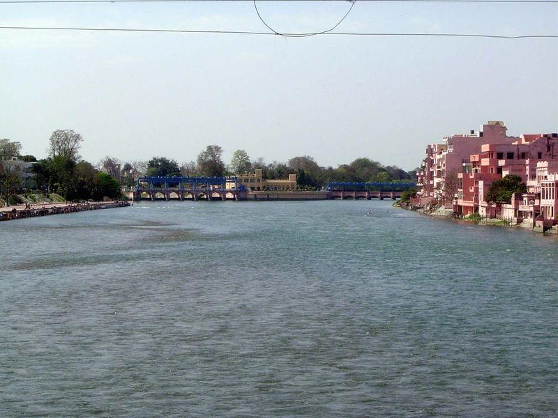 The headworks are in the distance on the right; the gates on the left are escapes to reduce flow into the canal. The "river" here—and that's