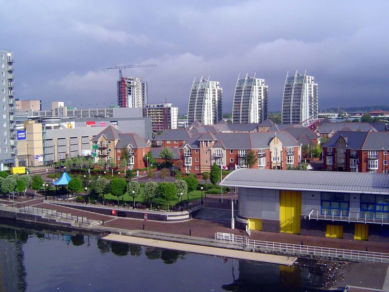 Another view of the renovated dock area, here showing the three bow-like profiles of the NV Buildings, apartments built by Countryside Prope