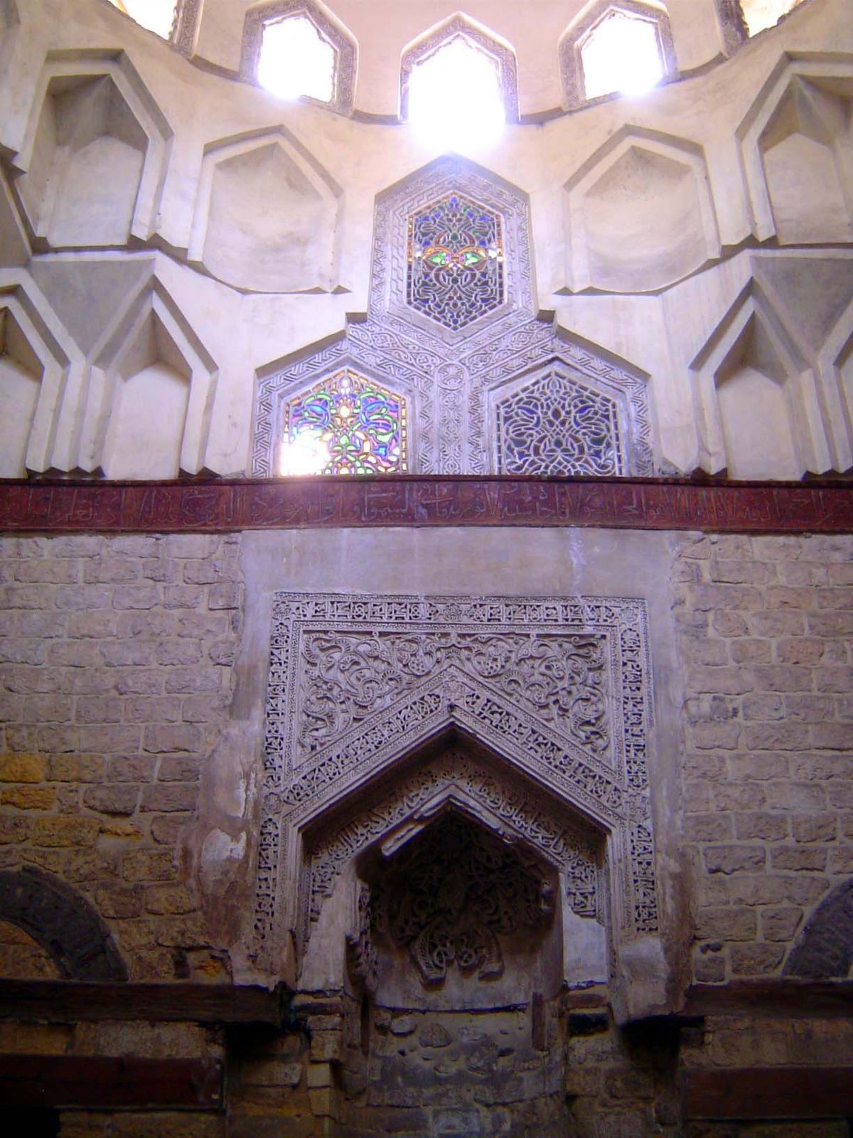 Mihrab with arabesques and inscription bands.
