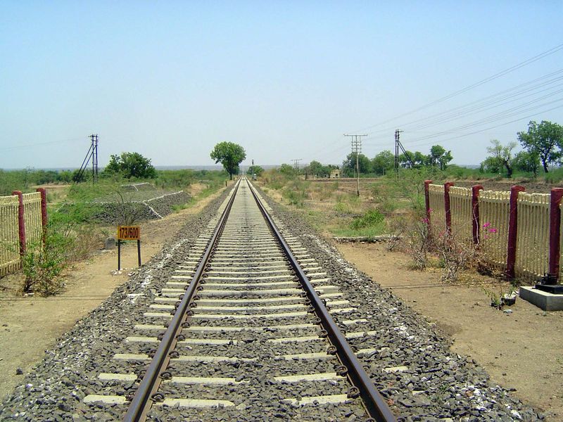 Just south of Bijapur, we cross a railroad track on a long, long tangent.