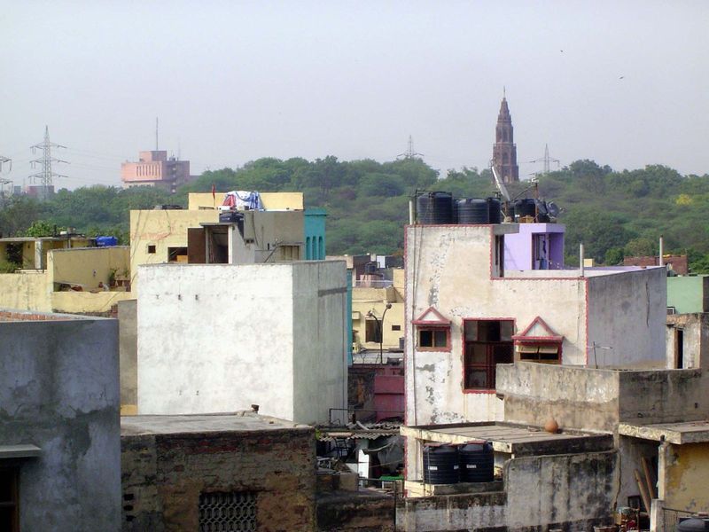 A cathedral tower rises from a ridge in North Delhi. Odd place for a cathedral, but it's a tip-off. No cathedral this.