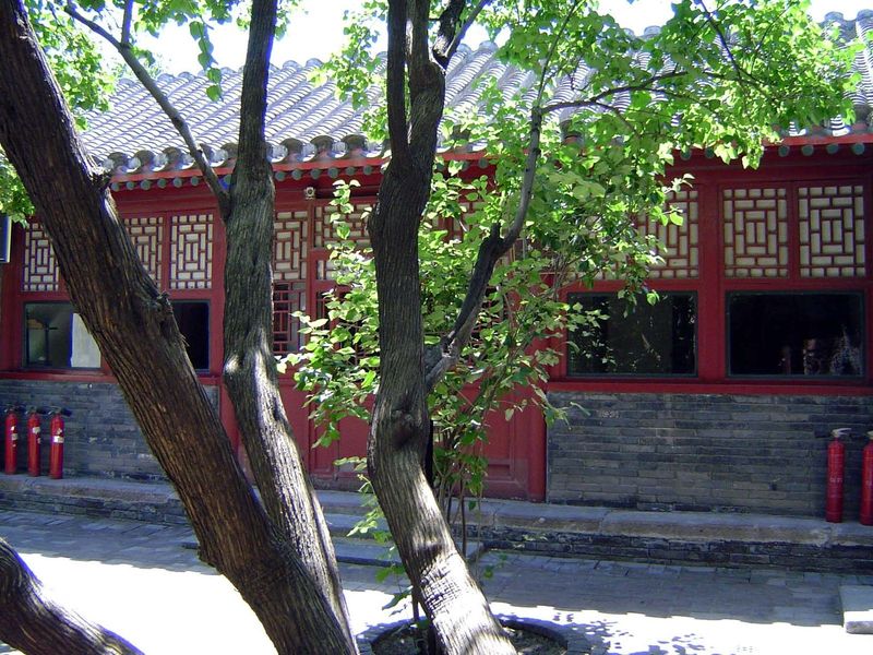 We've panned right now to take in the building occupying the south side of the courtyard. It's in shade.
