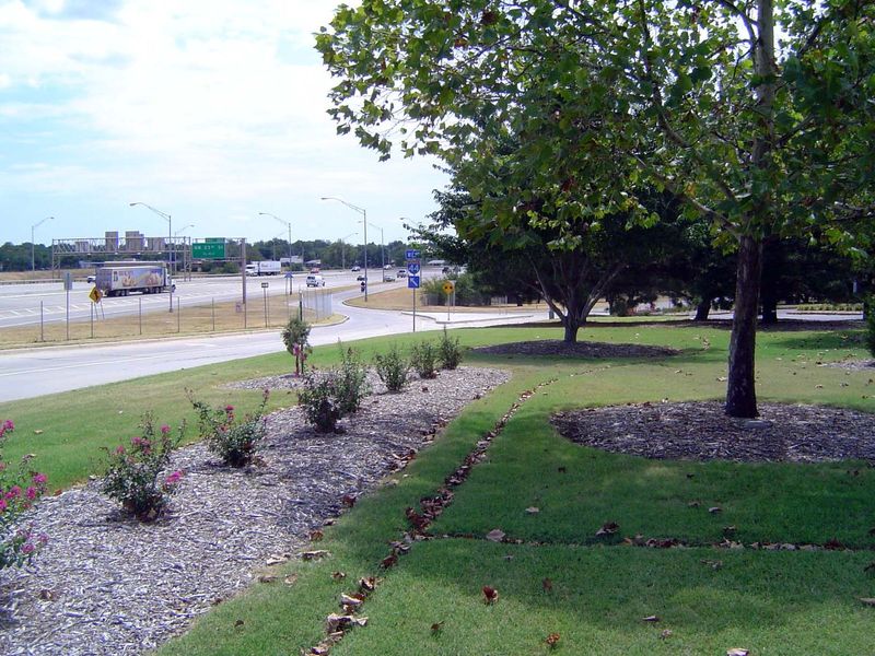 Highway engineers love parks so much that, given the chance, they'll run their pavement through them at every opportunity. Here, close by th