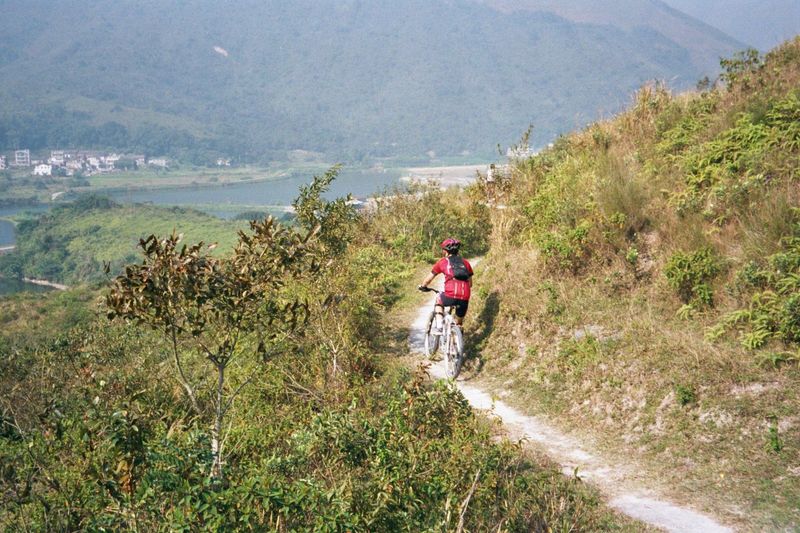 Whoosh! A couple of trail bikers whip past.