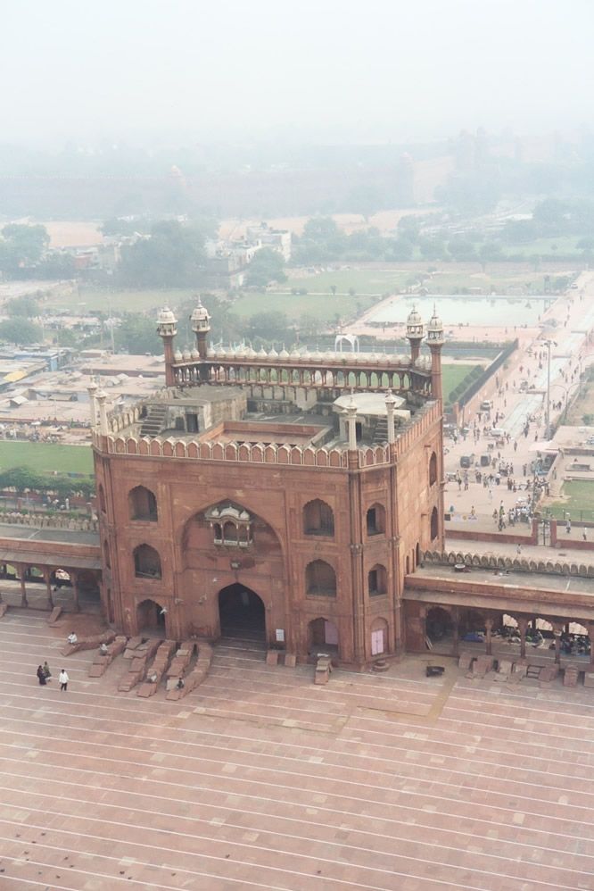 Looking down and east from the top of the same minaret. The Red Fort lies in the distance.