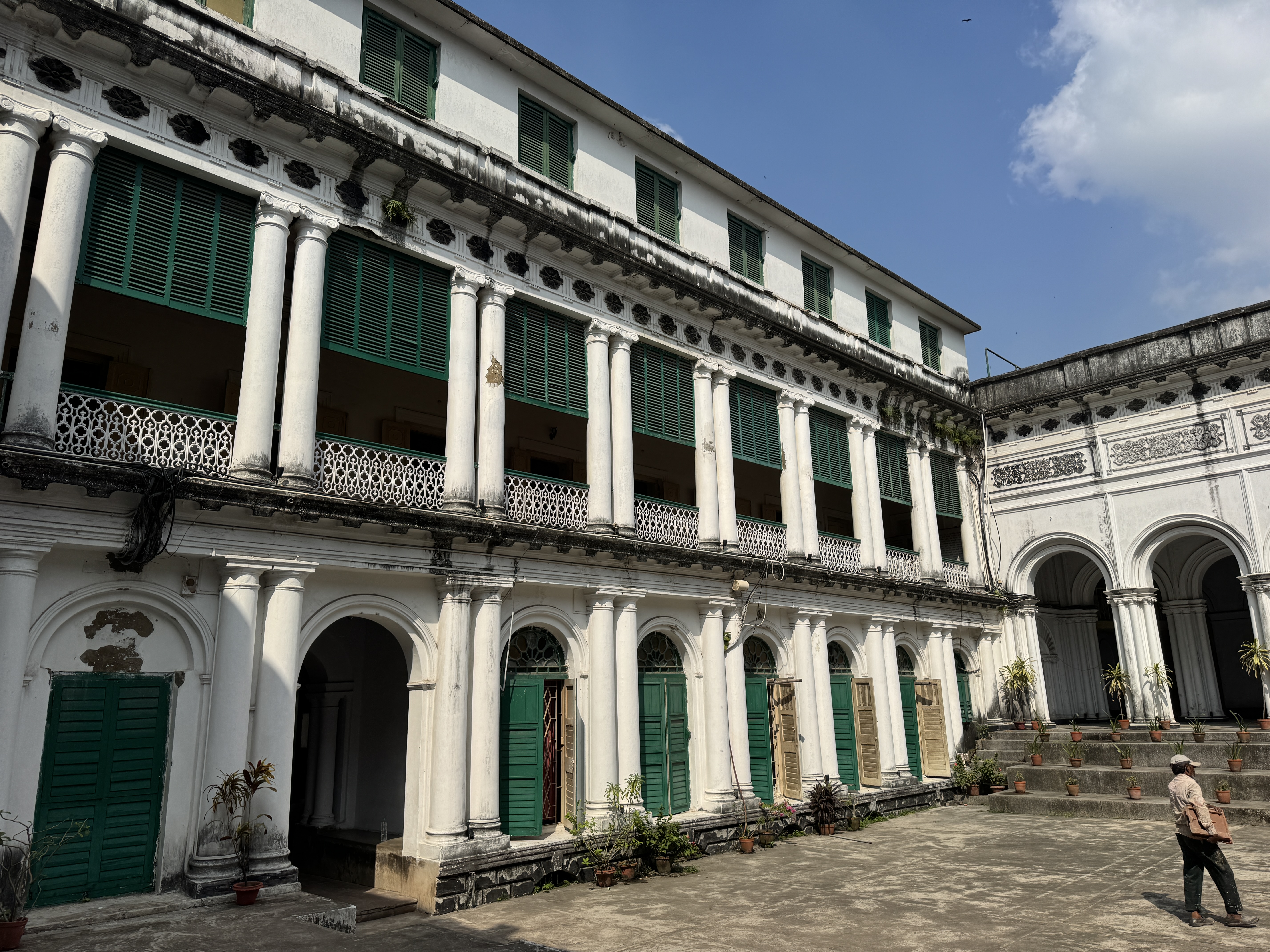 The older part of the house looks like this, with a matching facade on the other side of this courtyard.  I'm betting it was more colorful o