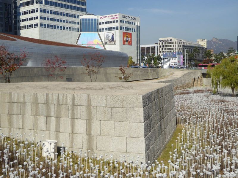Just to the south of the gate, the Japanese converted part of the wall into a sporting arena with an oval track. It's gone now—the Koreans a