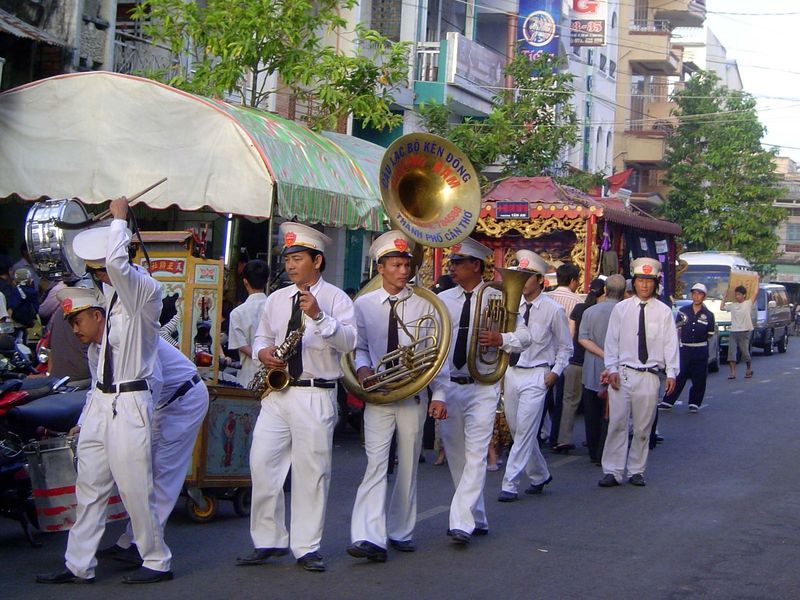 Maybe this qualifies if you consider the instruments and the clothes. The sign in the bell says Clarinet and Drum Club, in this case hired t