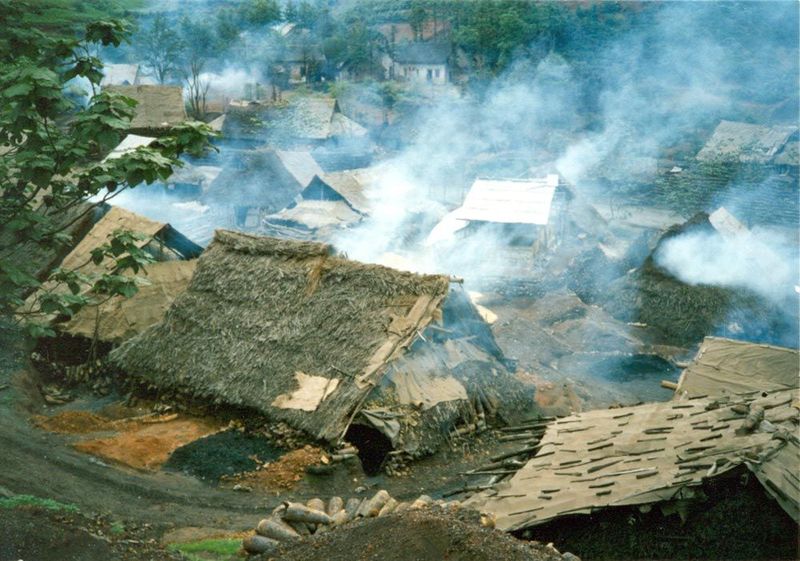 The work was done in huts like these, smoking like an inferno.