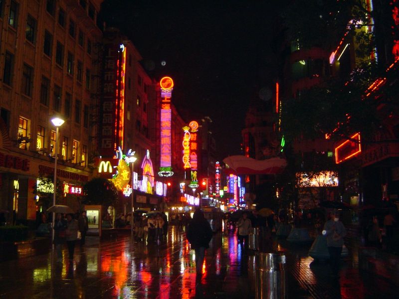 No other business street in the Far East shows such activity by day or such a blaze of brilliancy by night with the possible exception of th