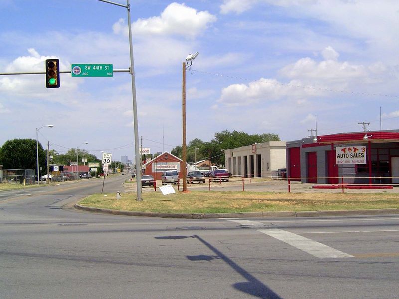 Freeways were about to transform shopping habits. Here, in a glimpse of Oklahoma City's highway network before freeways, is old U.S. 77, com