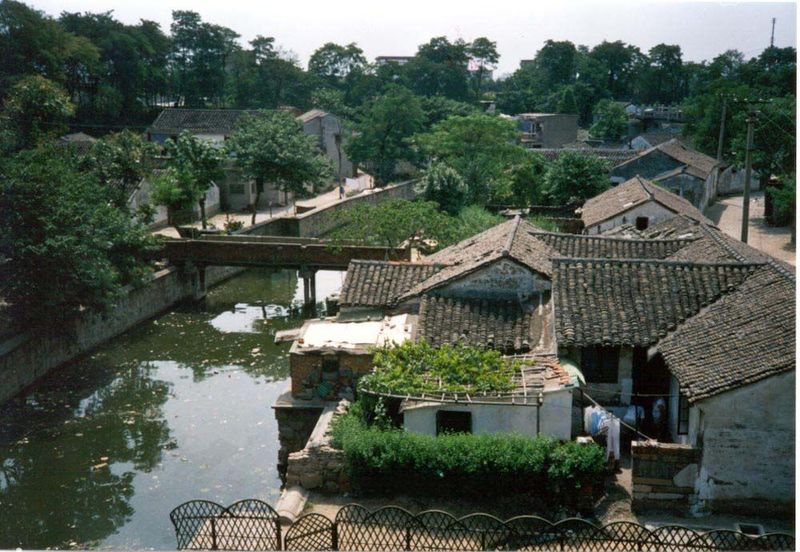 The city was famous for its double checkerboard: one of streets and another of water. The interior canals, like those of Bangkok, had a hard