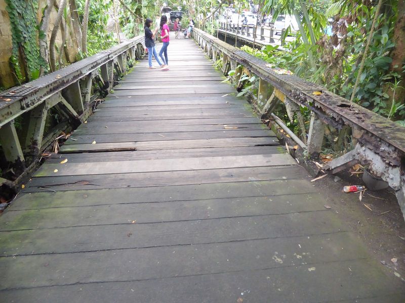 Want the good old days? Here's a rusted-out bridge, surviving next to its replacement. A visitor in 1927 wrote, "There are about half a doze