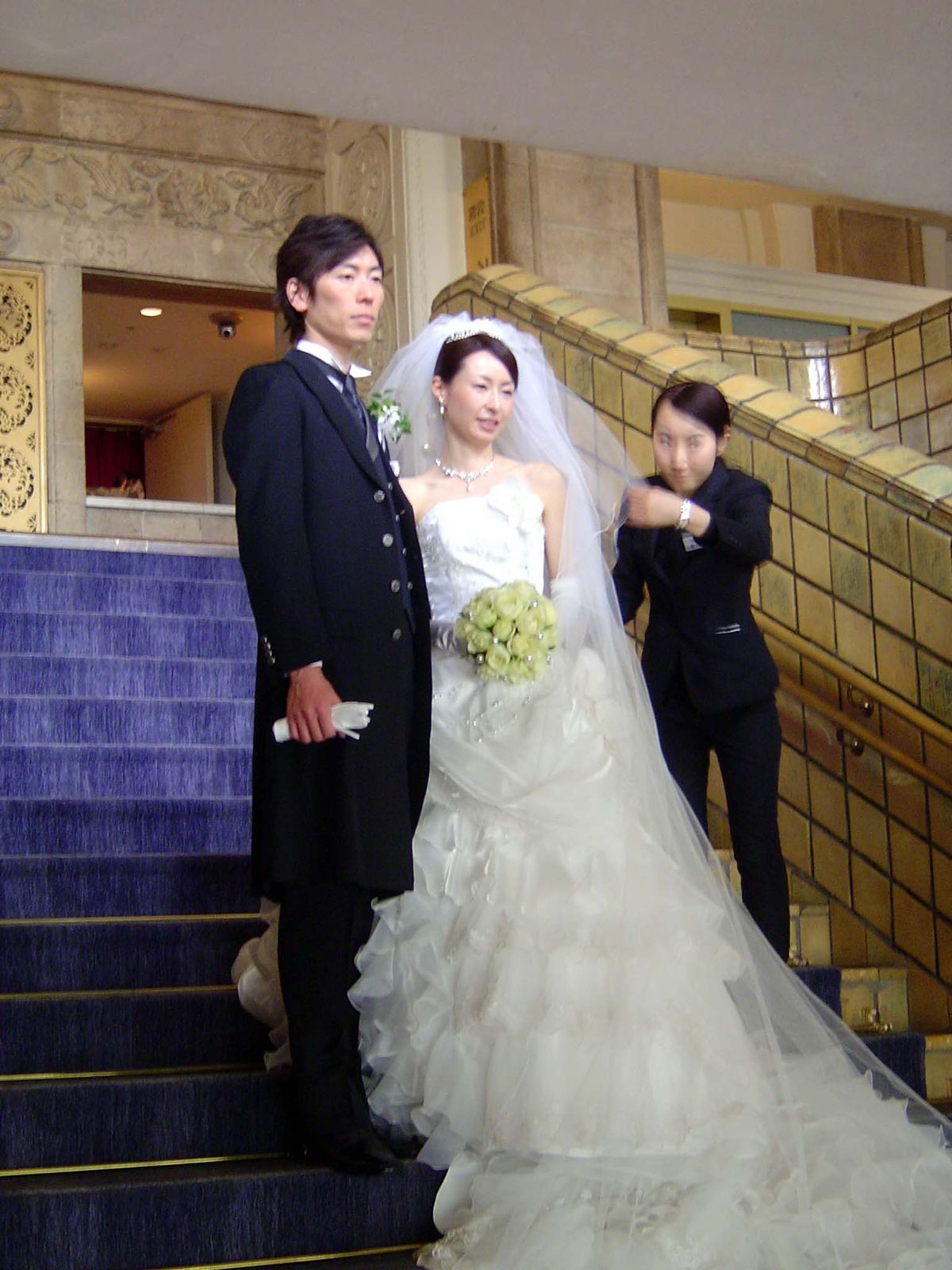 The main staircase remains grand enough for special occasions.