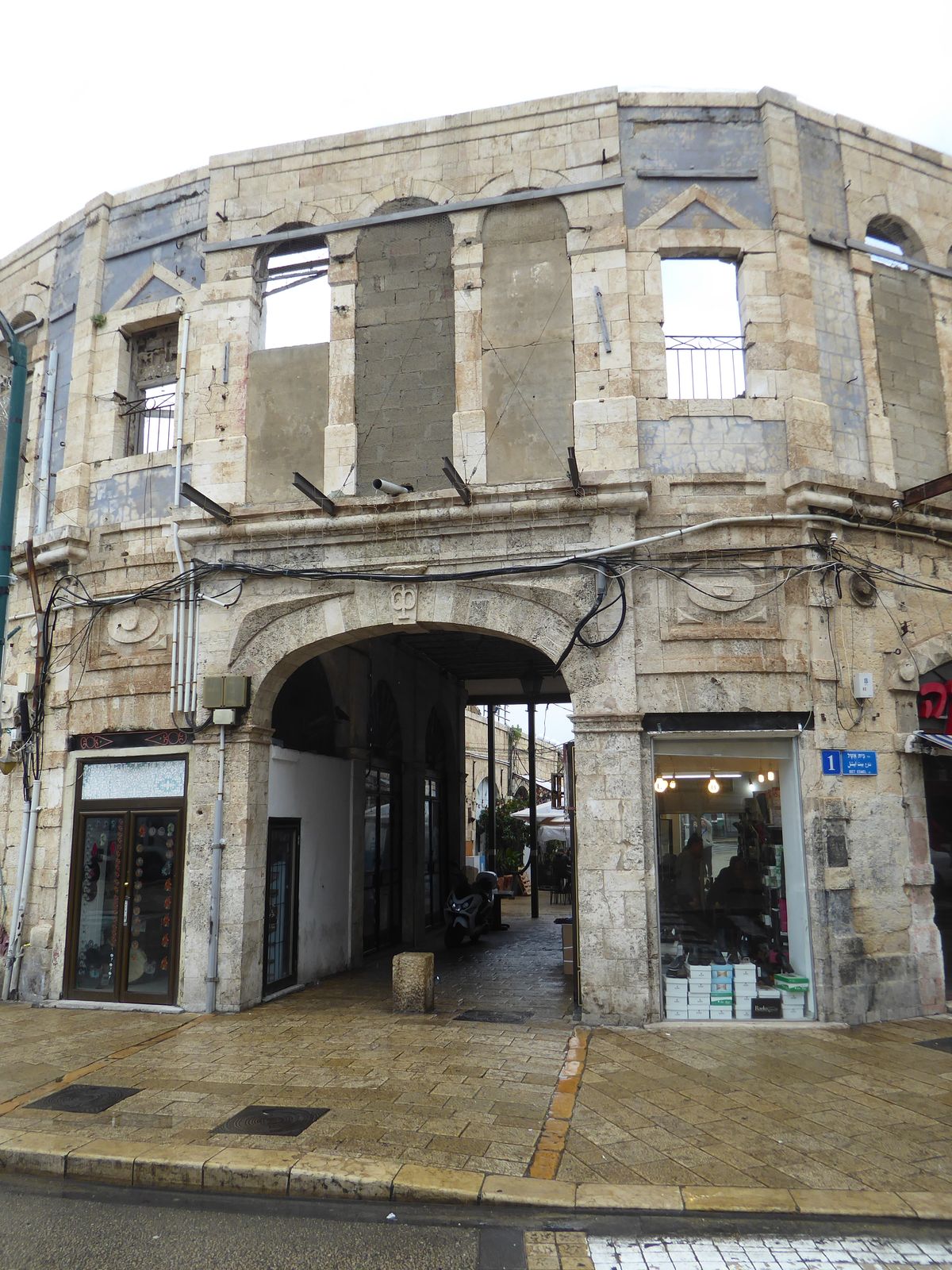 It still hints at the damage suffered in 1948.
