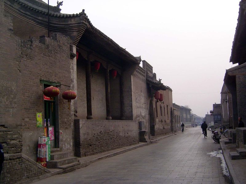 This house, the former residence of the pioneer banker Lei Lutai, is now a museum. Its exterior south wall is on the left here, with a shelt