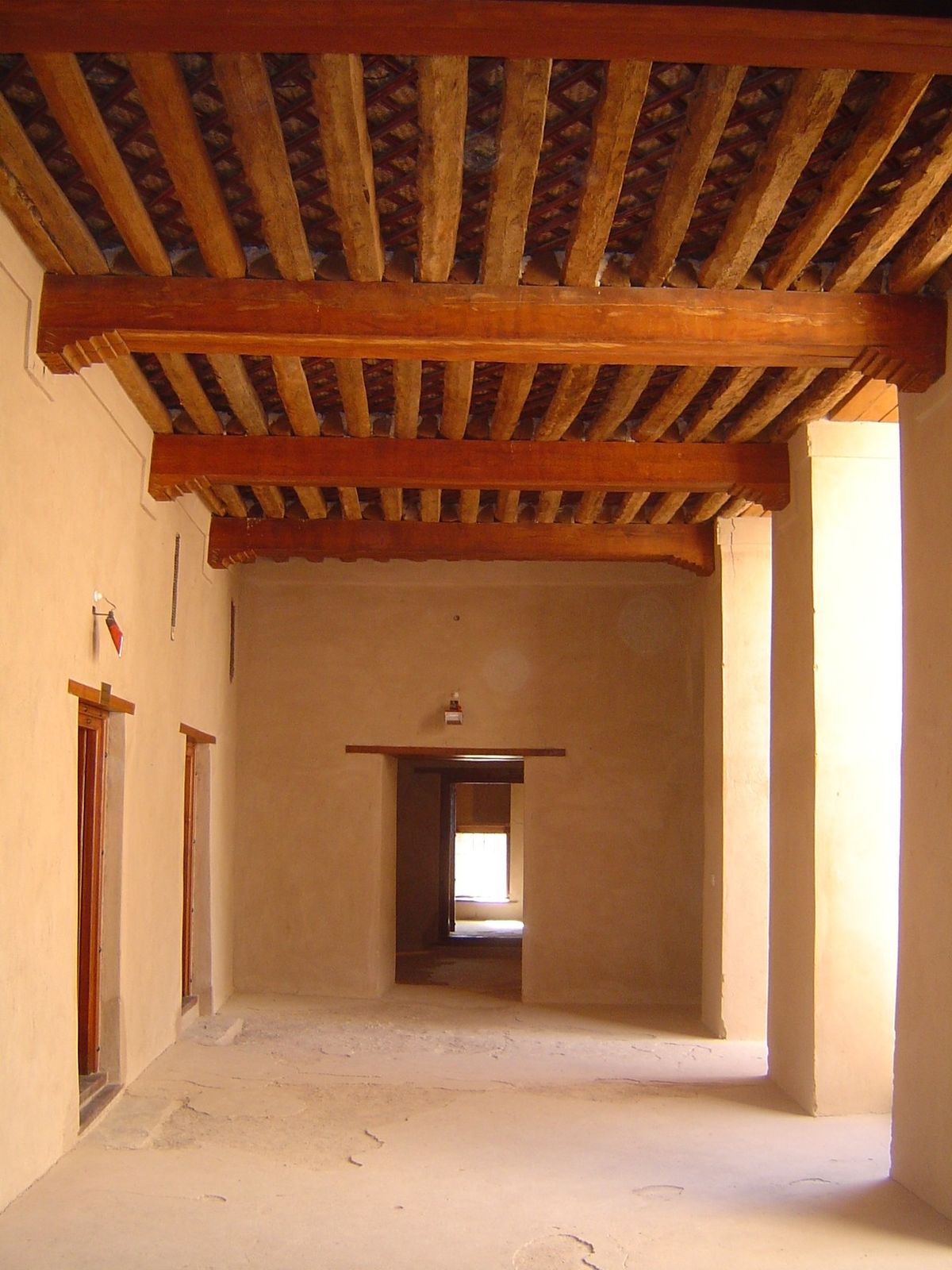 A palace portico, with palm-log joists.