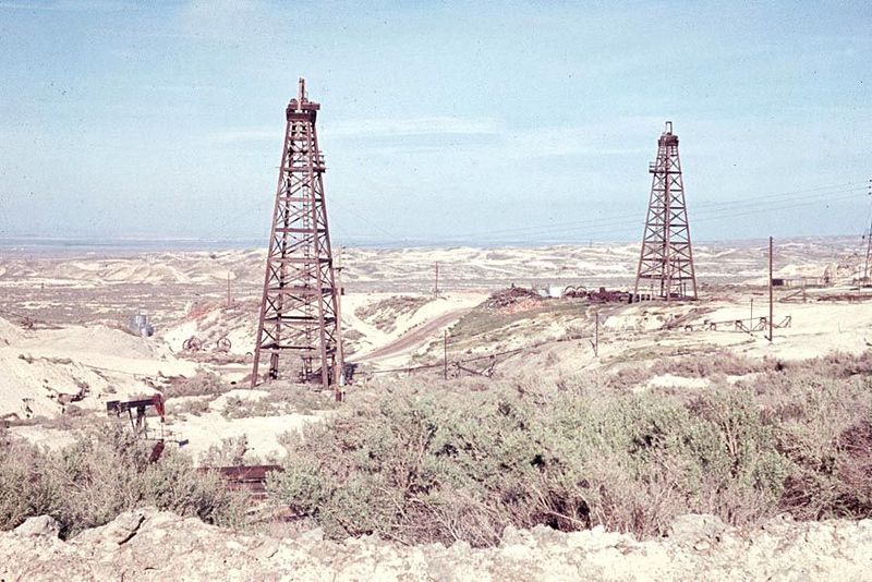 Redwood derricks, gone now, replaced by mobile rigs. While they lasted—and they were scarce even in the 1960s—they indicated property lines,