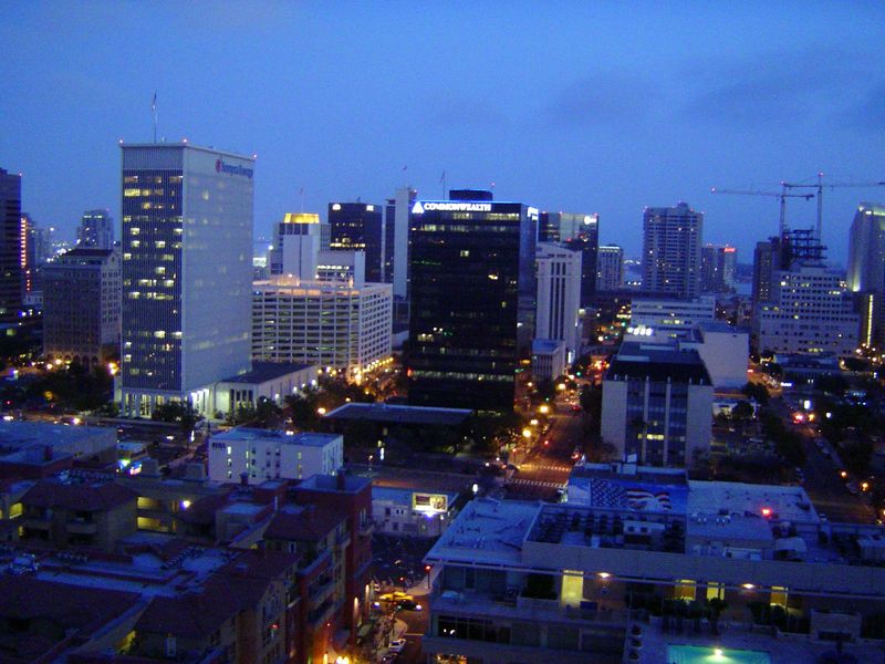 Not the palm trees you remember. It's been a long drive from LAX, and the dusk reveals a downtown much more towered-up than you remembered. 