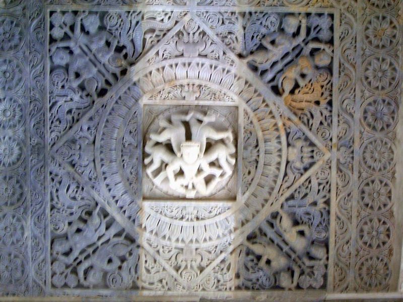 The center of the ceiling in one of the entrance halls or balanakas is decorated with a kichaka, a bearded man with five bodies representing