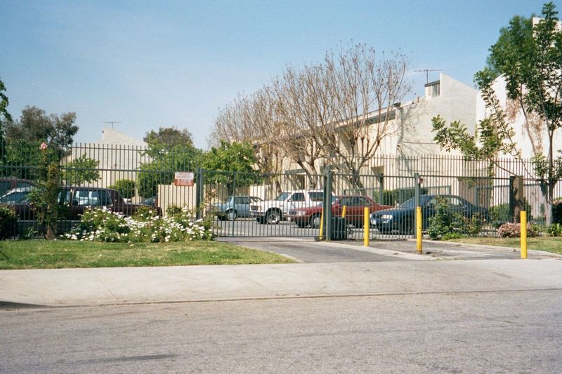 Watts also has apartments like these, off 103rd and Beach. Despite their heavy-duty security, they imply the existence of a community with h