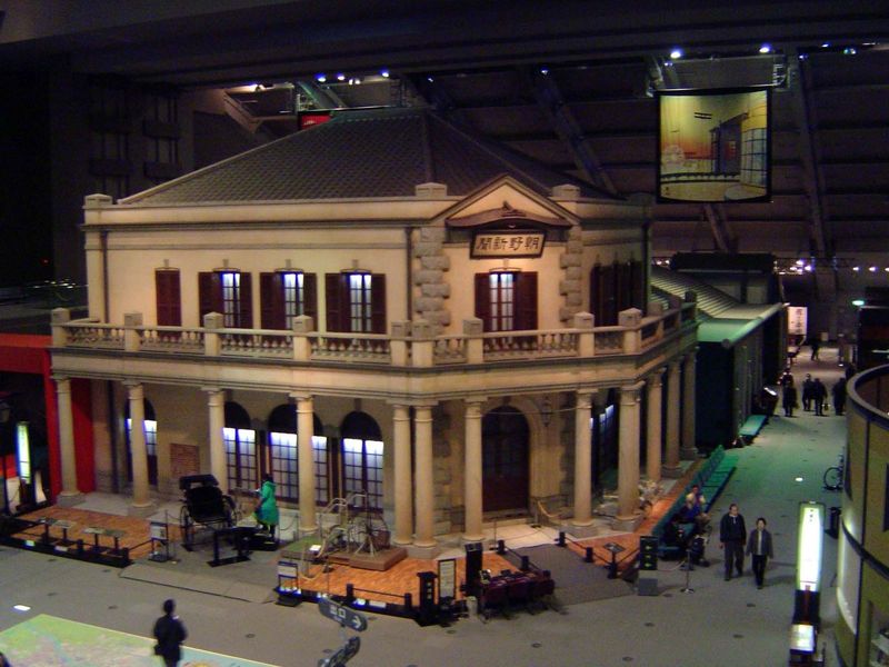 A reconstruction of a Waters building, in this case the offices of the Choya Shinbun, or Official and Unofficial News.