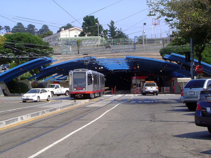All these places were west of Twin Peaks and the tunnel under them. The boy often rode his bicycle downtown over a circuitous route—Alemany 