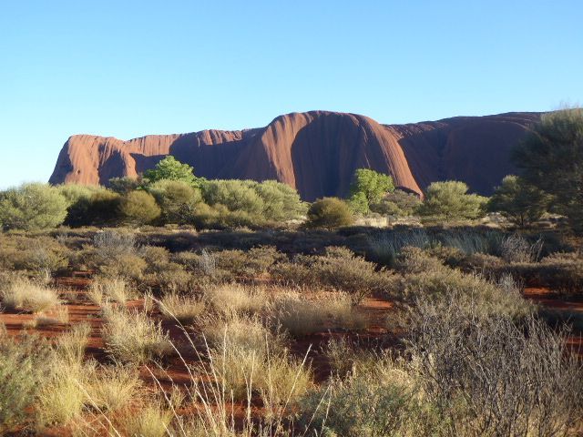 We've come around to the south side of the rock, the site of an epic battle between the carpet snakes kunia and the poisonous snakes liru.