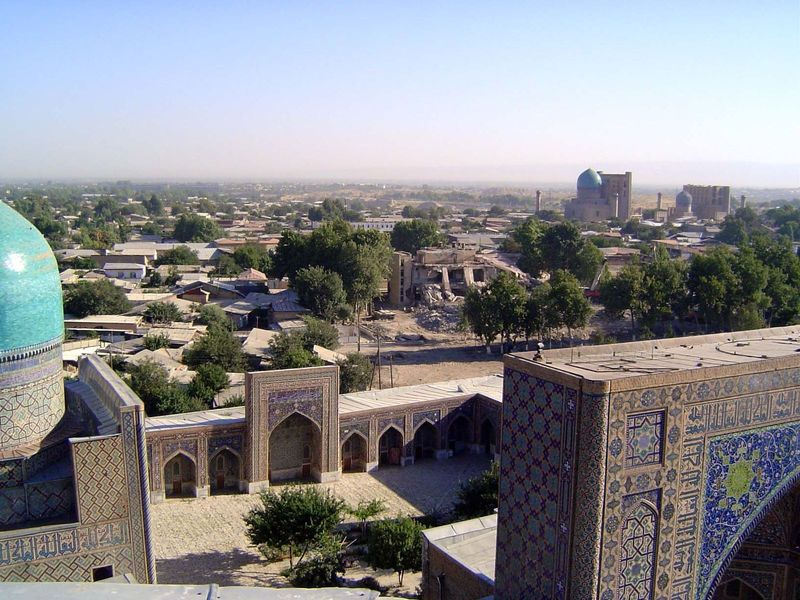 The view over the Tillya-Kari madrasa, with the mosque dome on the left. In the right distance is Tamerlane's Bibi Khanum mosque. It was Sam