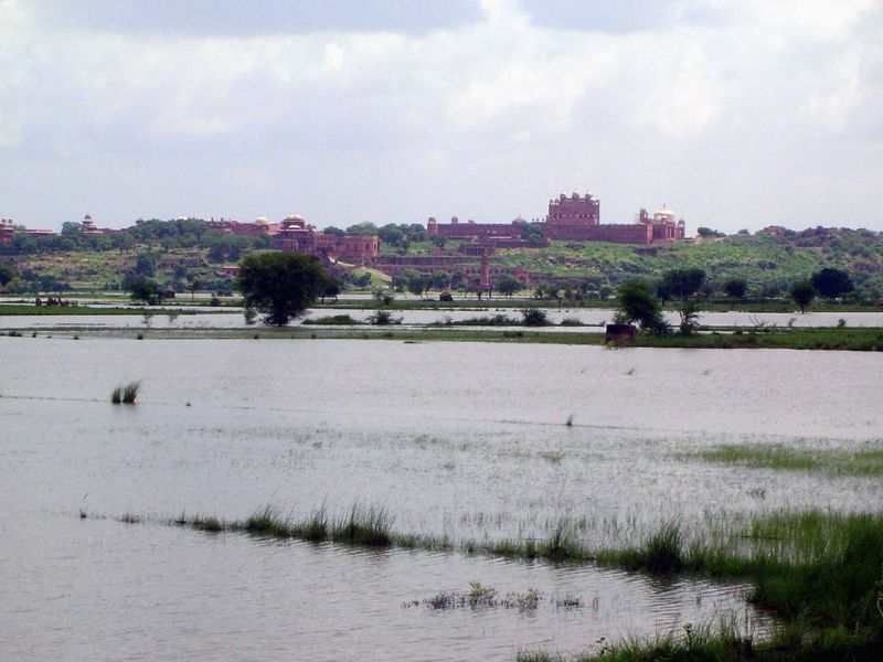 An hour's drive west of Agra—assuming you can avoid the traffic jams, which can be fierce—you come to Fatehpur Sikri, the city that Akbar bu