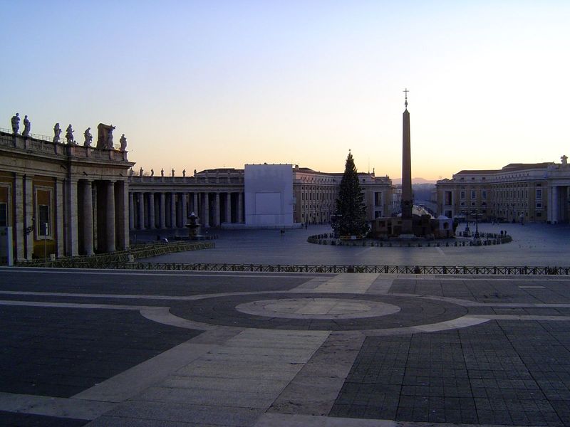 The view here is from the church steps and looking down the slightly offset path of the same street. Thank dawn for the absence of crowds. T