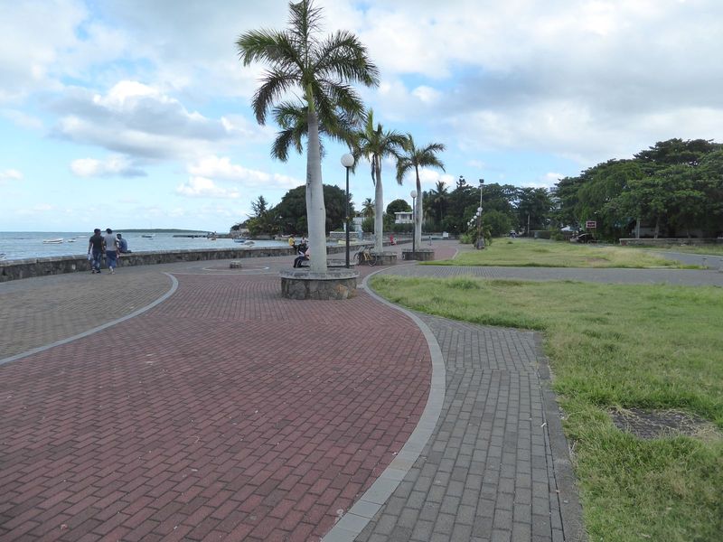 So here at three o'clock is a promenade replete with palms at the site of the demolished railway station at Mahébourg. The town is named for