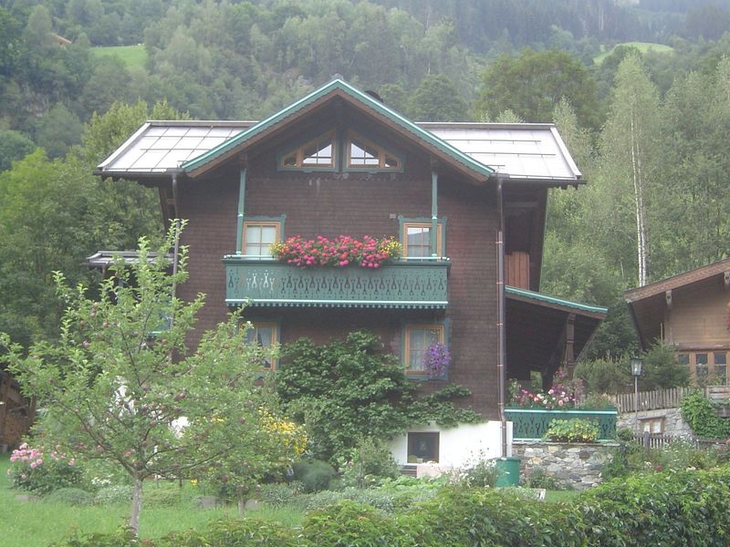 The valley floor is dotted with handsome houses.