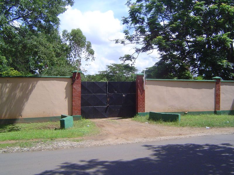 On the same crescent, a residence was planned here for the chief secretary. Peek over the wall now 2015, and there's only the rubble left ov
