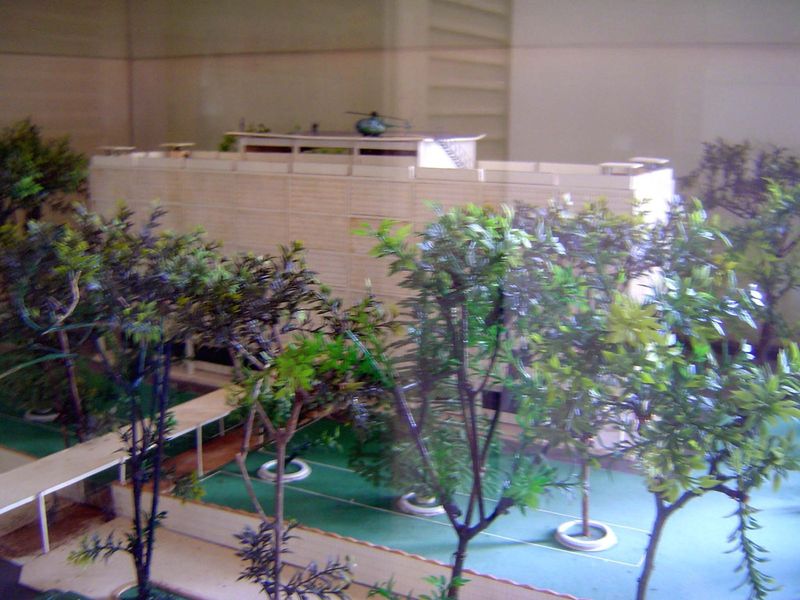 Model of the now demolished American embassy—it, too, with a helicopter.