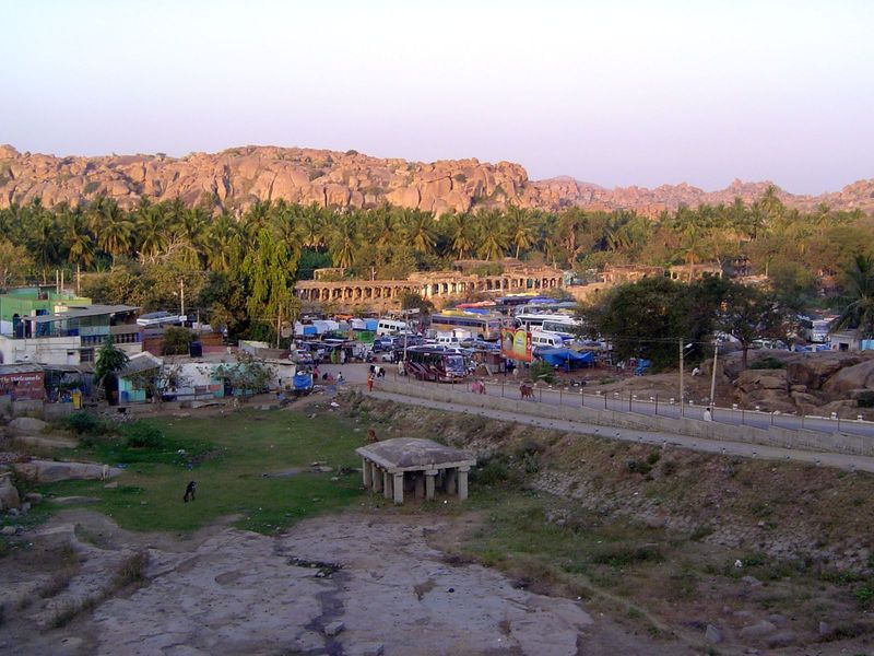 Hampi bazaar and parking lot as the sun goes down. The crowd hasn't dissipated much.